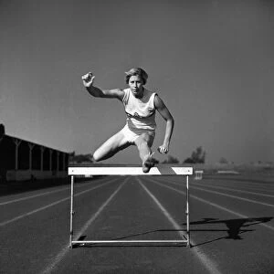 Sport: Athletic s. British runner Mary Rand pictured during training session
