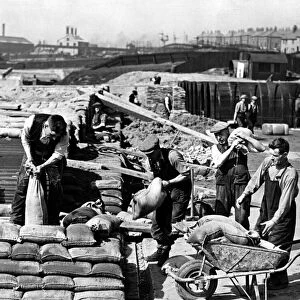 Work is pushed ahead on the group of ARP air raid shelters at the Vickers-Armstrong