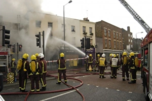 Firefighters at scene of fire, Stockwell Road, Brixton