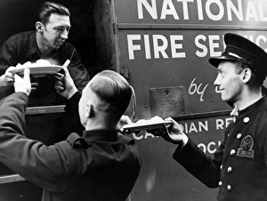 AFS firefighters being served from mobile kitchen, WW2