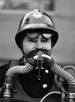 Firefighter in new breathing apparatus helmet