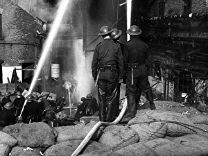 Blitz in London -- firefighters at work in Bermondsey, WW2