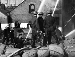 Blitz in London -- firefighters at work in Bermondsey, WW2