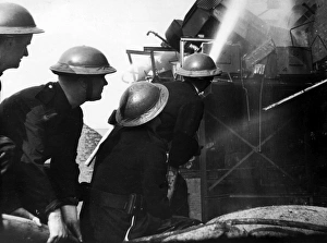 Blitz in London -- firefighters at work in Bermondsey, WW2