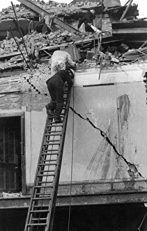 Rescuing casualty, Warwick Court, Holborn, WW2