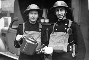 Tea break for AFS man and woman, London, WW2